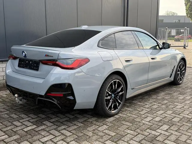 BMW i4 M50 High Executive 84 kWh 19"/SOH 99%/Schuif-kanteldak/Trekhaak/Leder + memory/Stoel + stuurv...