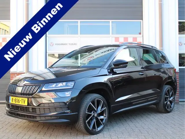 ŠKODA Karoq 1.5 TSI ACT Sportline Business Automaat /NAVI/PDC/Camera/CANTON/LED/19'LM/Virtual Cockpi...