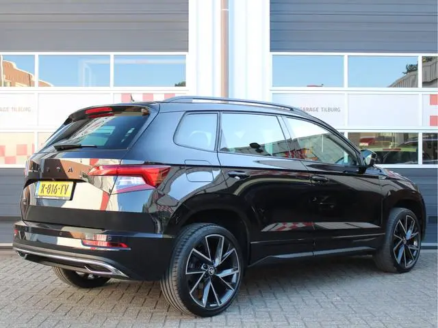 ŠKODA Karoq 1.5 TSI ACT Sportline Business Automaat /NAVI/PDC/Camera/CANTON/LED/19'LM/Virtual Cockpi...