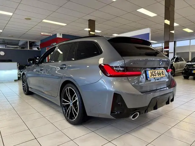 BMW 3-serie Touring 330e xDrive *PANO*H&K*360CAM*LEER*HUD*VOL*