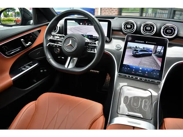 Mercedes-Benz C-klasse Estate 300 e AMG Line Pano HUD Trekh Distr 360 Night 2xMemo