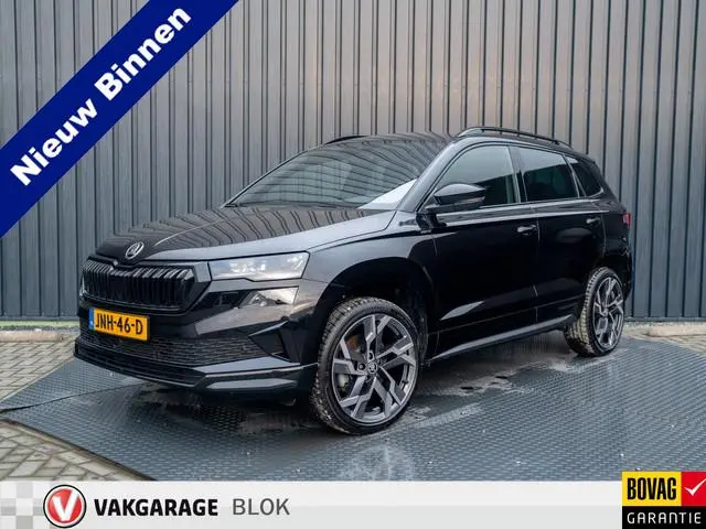 ŠKODA Karoq 1.5 TSI ACT Sportline Business | Elk. A- Klep | Camera | 19'' | Adapt. Cr. | Keyless | S...