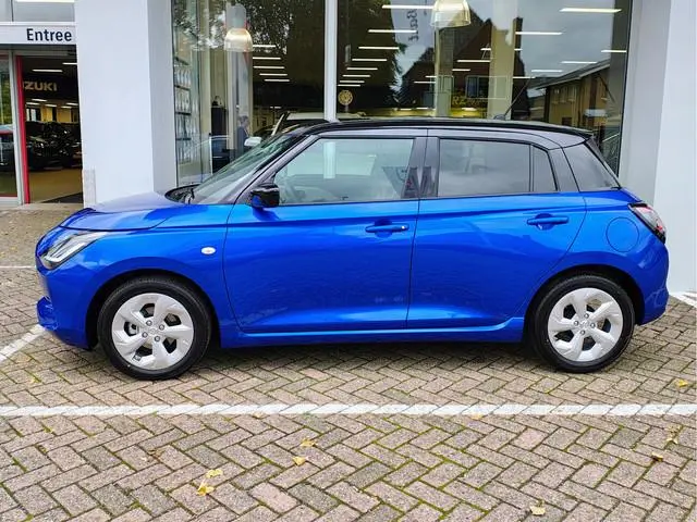 Suzuki Swift 1.2 STYLE SMART HYBRID AUTOMAAT Direct Leverbaar | Tot 10 JAAR GARANTIE! Inclusief € 2....
