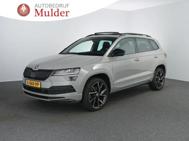 Skoda Karoq 1.5 TSI ACT Sportline Business | Pano | Winterpakket | ACC | Keyless | Camera | Dodehoek...