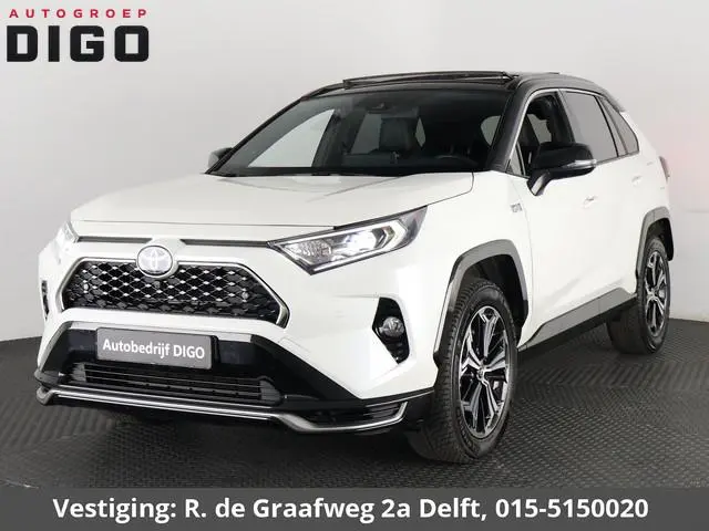 Toyota RAV4 2.5 Plug-in Hybrid AWD Bi-Tone Plus | 1500 KG trekgewicht | JBL Audio | Stoelverwarming...