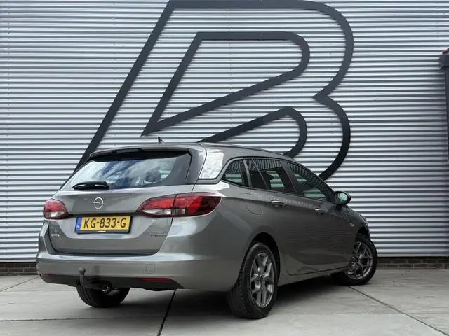 Opel Astra Sports Tourer 1.4 Business+ 1e Eigenaar|Navi|Cruise|Trekhaak|Carplay|PDC V+A|Airco|Goed o...