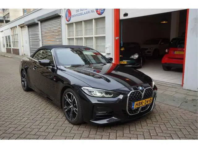 BMW 4-serie Cabrio 420i High Executive 3x M-SPORT (Exterieur/ Interieur/ Onderstel) | BMW Garantie 12/2026 | Black on Black | Nieuwstaat | Keyless | Led | Apple | Memory | Virtual Cockpit | Sfeerverlichting