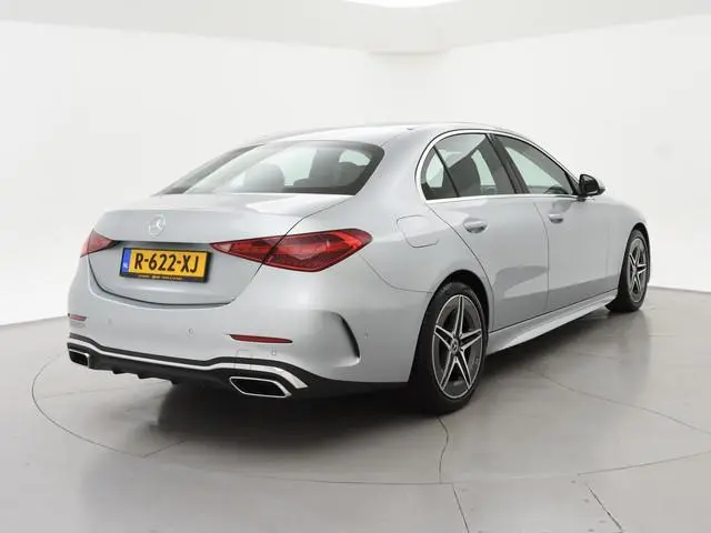 Mercedes-Benz C-klasse 180 AMG LINE SEDAN + SFEERVERLICHTING | CAMERA | STOELVERW.