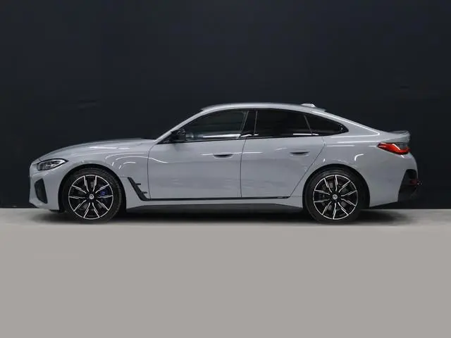 BMW i4 M50 High Executive 84 kWh [TREKHAAK, APPLE CARPLAY, HEAD-UP DISPLAY, STOELVERWARMING, CRUISE...