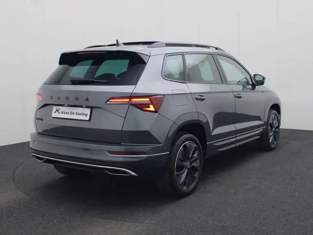 Skoda Karoq 1.5TSI/150PK ACT Sportline DSG · Panoramadak · 360°Camera + Parkeersensoren · Navigatie...