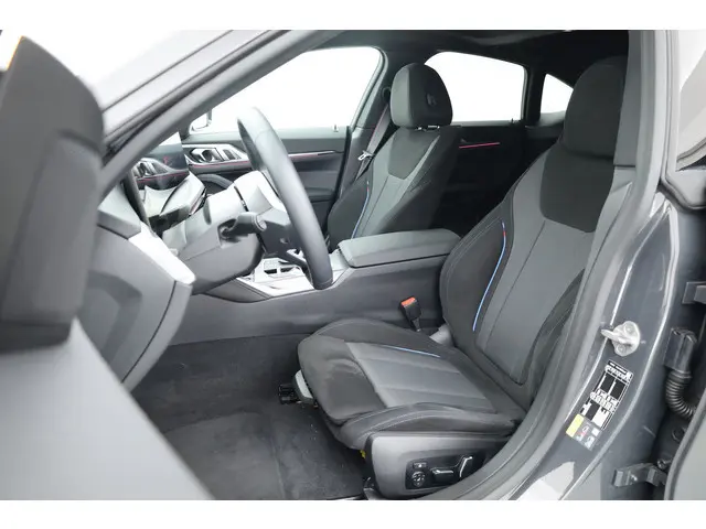 BMW i4 eDrive40 M Sport Pro 84 kWh | Rijklaar! | S/K-Dak | Elek. Trekhaak | Shadowline | Widescreen...
