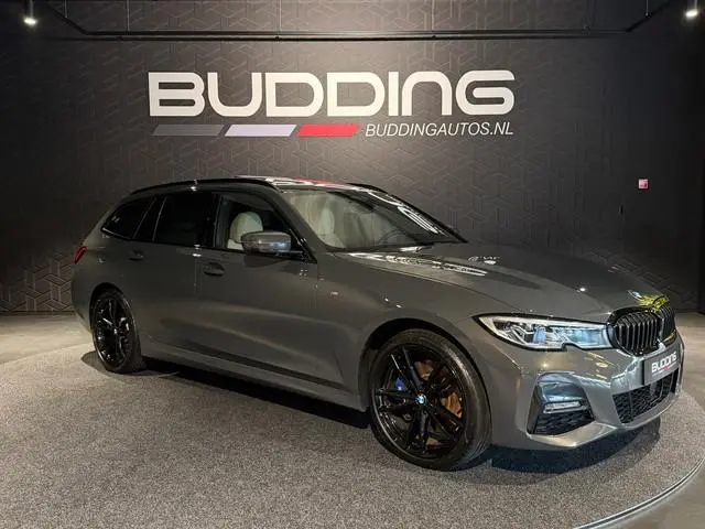 BMW 3-serie Touring 330e xDrive High Exe | M-sport | Dravitgrau | Pano | Trekhaak | Memory