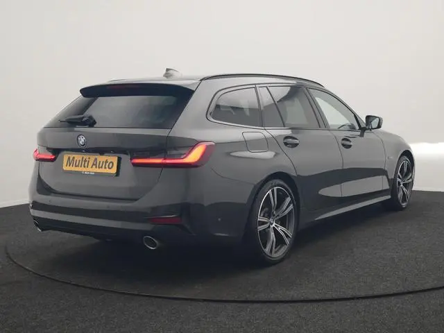 BMW 3-serie Touring 330e Sportline PHEV 293pk Dealer O.H. | Dravitgrau | Trekhaak Af Fabriek | Adapt...