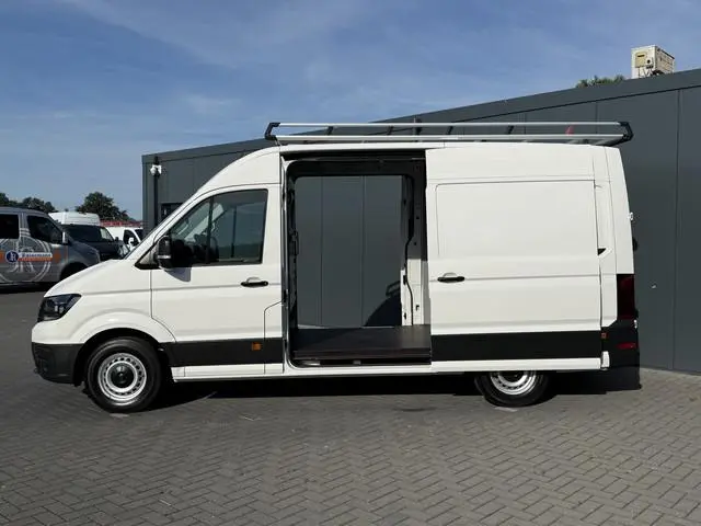 Volkswagen Crafter 2.0 TDI 141 PK / L3H3 / 2x SCHUIFDEUR / IMPERIAAL + LADDER / 3 TONS TREKHAAK / CA...