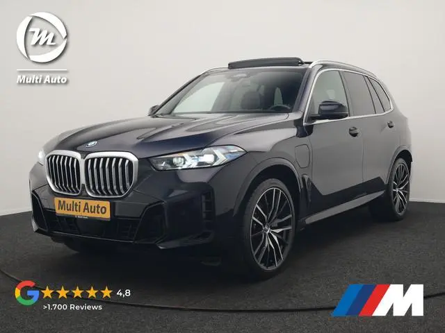 BMW X5 xDrive50e M Sport PHEV 490pk Dealer O.H. | Panodak Sky Lounge | Luchtvering | Head Up | 360 C...