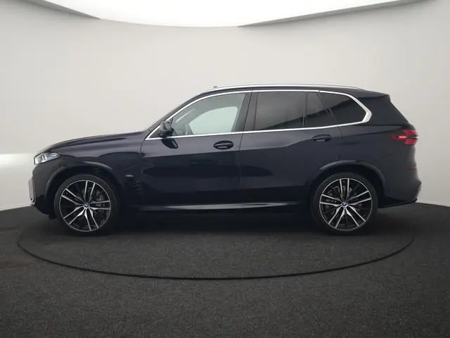 BMW X5 xDrive50e M Sport PHEV 490pk Dealer O.H. | Panodak Sky Lounge | Luchtvering | Head Up | 360 C...