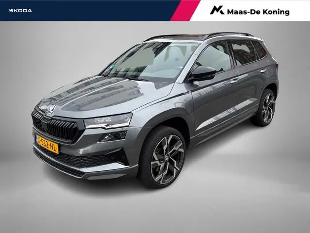 Skoda Karoq 1.5TSI/150PK DSG ACT Sportline Business · Panoramadak · Trekhaak · Apple/Android Car pla...