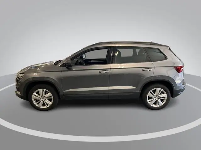 Skoda Karoq 1.5 TSI ACT 150pk DSG Business Edition · Camera · Inklap. Trekhaak · Keyless · Stuur- &...