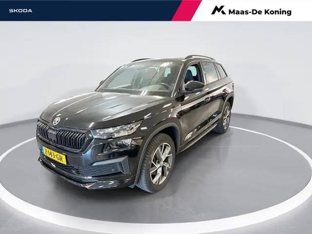 Skoda Kodiaq 1.5 TSI 150pk DSG Sportline Business 7p. · Camera · Wegklapbare Trekhaak · 7 Persoons ·...