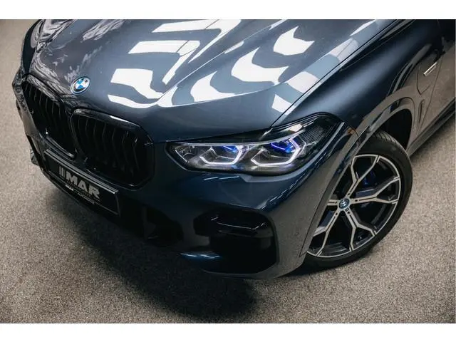 BMW X5 xDrive45e High Executive | M-sport | Luchtvering | Pano | Head-Up | Trekhaak | 360 camera |