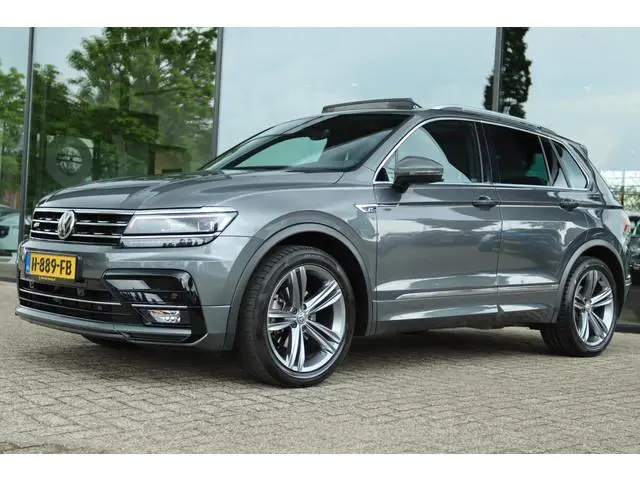 VOLKSWAGEN TIGUAN 1.5 TSI ACT AUT. R-LINE HIGHLINE BUSINESS | PANO | VIRT. COCKPIT | TREKHAAK | CARP...