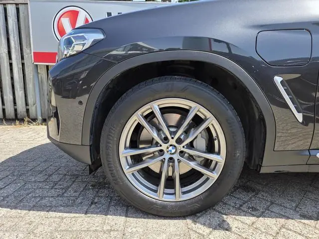 BMW X3 xDrive30e 19"/Trekhaak/Leder + memory/Adaptieve cruise/Keyless/Dodehoek/Head-up/360 camera/Hi...