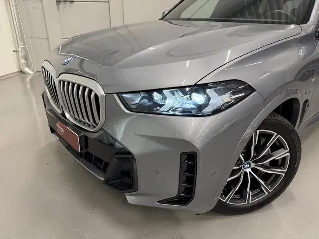BMW X5 xDrive50e M-Sport SKYSCRAPER/PANO-SKY LOUNGE/TREKHAAK/MERINO LEER COMFORT/LUCHTVERING/H&K/20"...