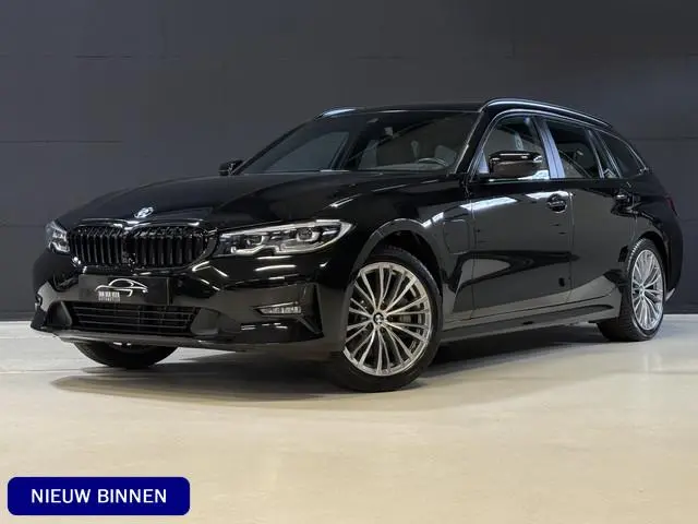 BMW 3-serie Touring 330e Business Edition Plus | Vol leder | Elektr. trekhaak | Harman/Kardon