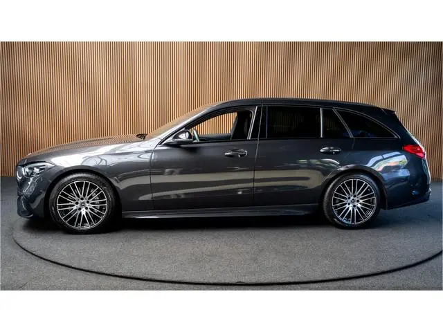 Mercedes-Benz C-klasse Estate 180 AMG Line Leer Camera Navi LED Nightpack PTS Ambient Elekt. achterk...