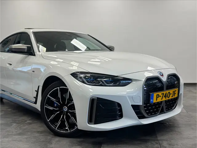 BMW i4 M50 High Executive 84 kWh M-sport ACC 360 Camera schuifkanteldak H&K 544PK NL Auto ! 2e Paasd...