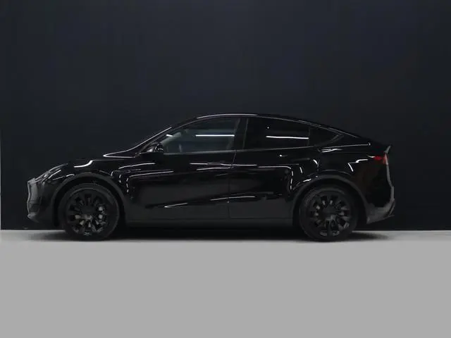 Tesla Model Y RWD 58 kWh [PANORAMADAK, APPLE CARPLAY, ANDROID AUTO, ELEKTRISCHE STOELEN, PDC, CAMERA...