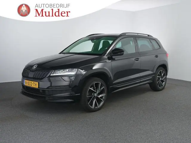 Skoda Karoq 1.5 TSI ACT Sportline Business | Zwenkhaak | Winterpakket | Canton | ACC | Dodehoeksenso...
